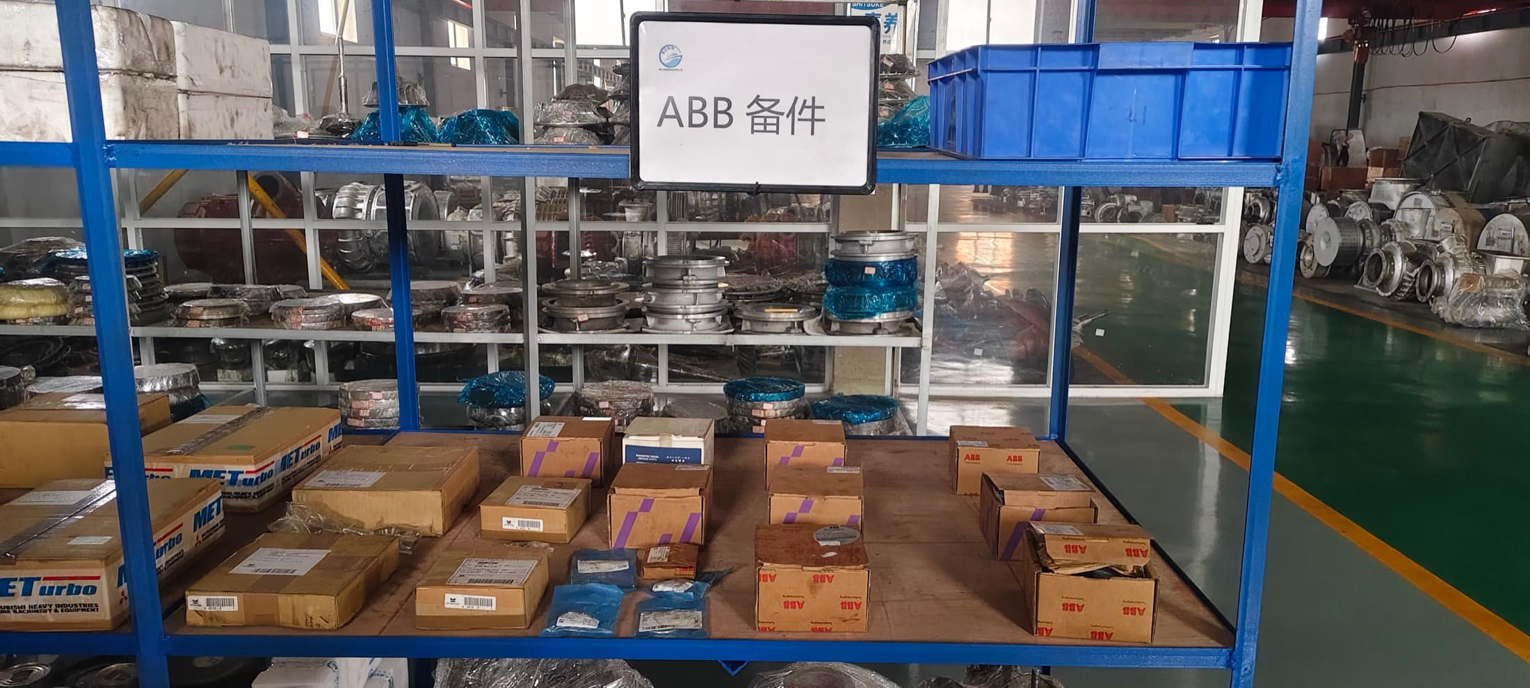ABB OEM spare parts stock on workshop shelving