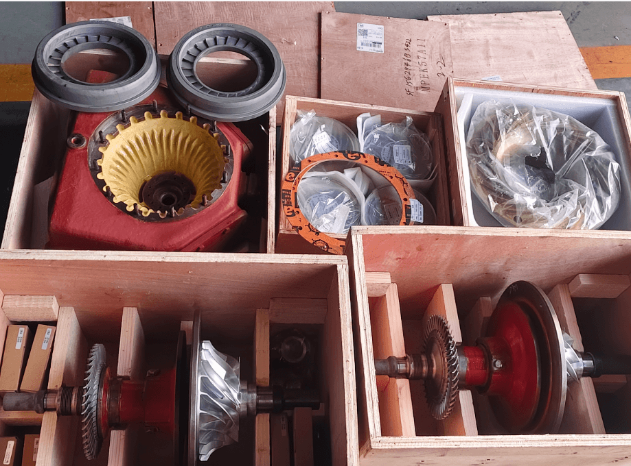 Wooden crates containing turbocharger rotors, casing components and spare parts